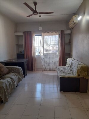 Living Room in 2 BHK Apartment at Amba Vatika, Nibm – for Rent