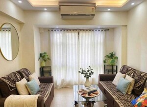 Living Room in 2 BHK Apartment at Malad West – for Sale