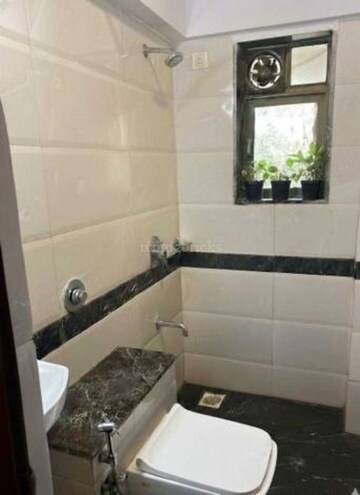 Bathroom in 2 BHK Apartment at Malad West – for Sale