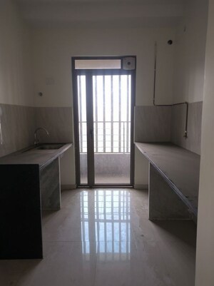 Kitchen in 2 BHK Apartment at Kalpataru Paramount, Kapur Bawdi – for Sale