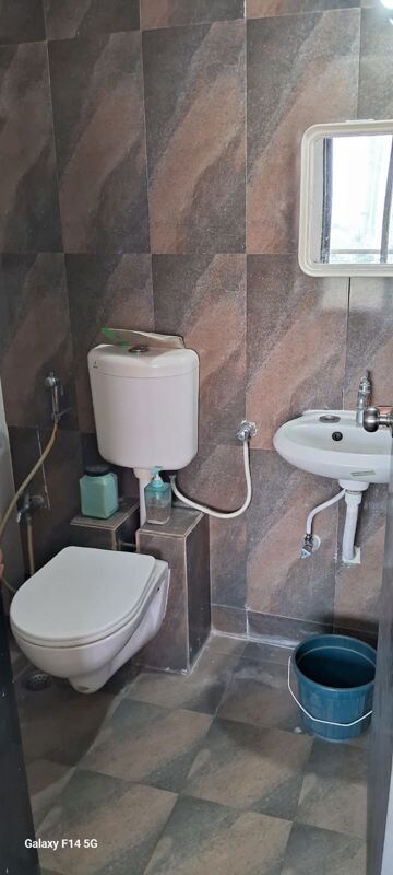 Bathroom in 1 BHK Apartment at Iris CHS, Kasarvadavali – for Rent