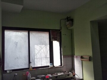 Kitchen in 1 BHK Apartment at Soham Parijat Gardens, Ghodbunder Road – for Rent