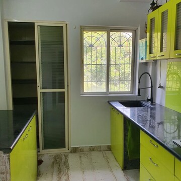 Kitchen in 1 BHK Apartment at Puranik Hometown, Ghodbunder Road – for Rent