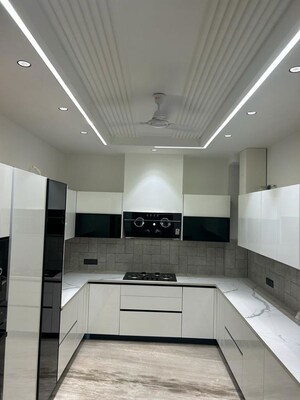 Kitchen in 4 BHK Builder Floor at Sushant Lok I – for Sale