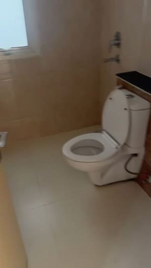 Bathroom in 2 BHK Builder Floor at Wave Executive Floors, Wave City – for Rent