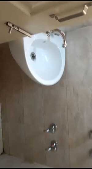 Bathroom in 1 BHK Apartment at Wave Dream Homes, Wave City – for Sale