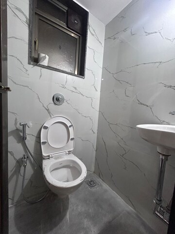 Bathroom in 1 BHK Apartment at Adnani Glory Apartments, Borivali West – for Rent