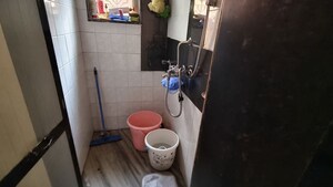 Bathroom in 1.5 BHK Apartment at Dudhsagar Apartment, Goregaon East – for Rent