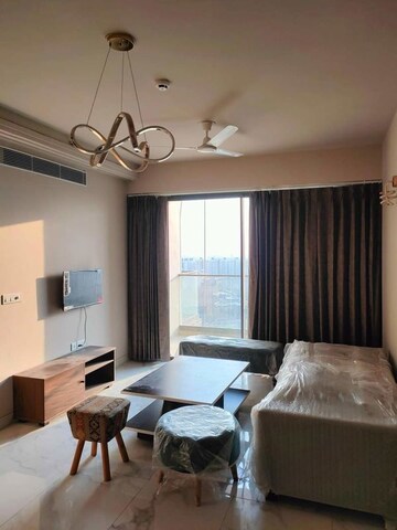 Living Room in Studio Apartment at M3M Skywalk, Sector 74 – for Rent