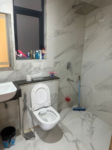 Bathroom in Studio Apartment at M3M Skywalk, Sector 74 – for Rent