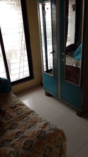 Master Bedroom in 2 BHK Apartment at Aniruddha Enclave, Kamothe – for Rent