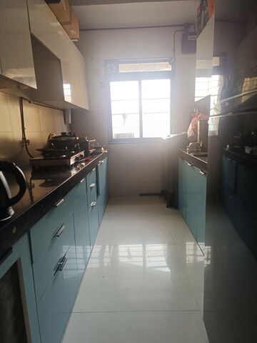 Kitchen in 2 BHK Apartment at Acme Ozone, Manpada – for Sale