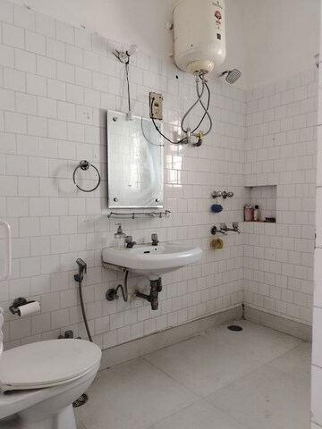Bathroom in 2 BHK Apartment at Vasant Kunj – for Rent