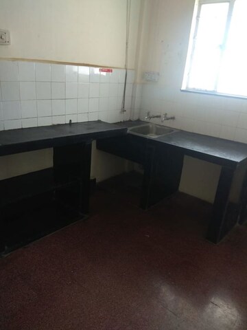 Kitchen in 1 BHK Apartment at Bhusari Colony – for Sale