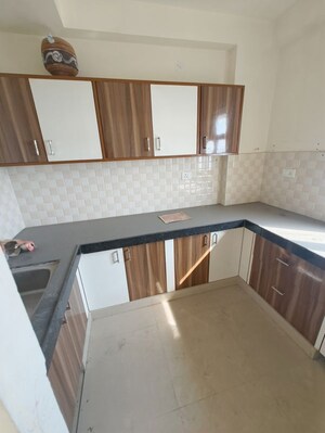 Kitchen in 2.5 BHK Apartment at Unique Sapphire, Mohanpura – for Rent