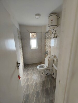 Bathroom in 2.5 BHK Apartment at Unique Sapphire, Mohanpura – for Rent