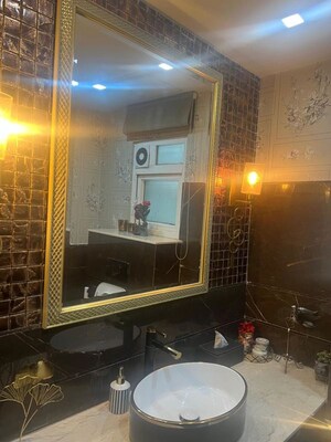 Living Room in 4 BHK Apartment at Tata Raheja Raisina Residency, Sector 59 – for Sale