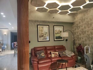 Living Room in 4 BHK Apartment at Tata Raheja Raisina Residency, Sector 59 – for Sale