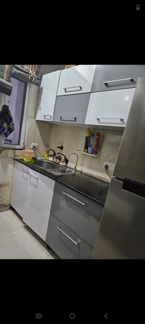 Kitchen in 2.5 BHK Apartment at Express Zenith, Sector 77 – for Rent