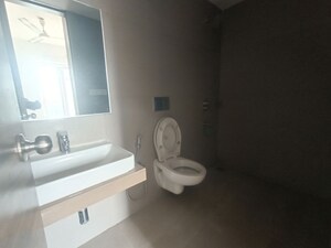 Bathroom in 2 BHK Apartment at Akshar Alvario, Seawoods – for Rent
