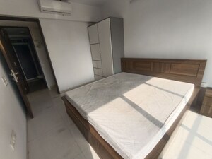 Bedroom in 2 BHK Apartment at Akshar Alvario, Seawoods – for Rent