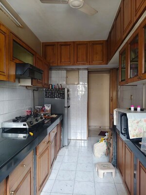 Kitchen in 2 BHK Apartment at Powai Cosmopolitan CHS, Powai – for Rent
