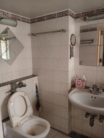 Bathroom in 2 BHK Apartment at Powai Cosmopolitan CHS, Powai – for Rent
