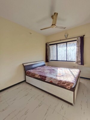 Bedroom in 2 BHK Apartment at Cosmos Heritage, Manpada – for Sale