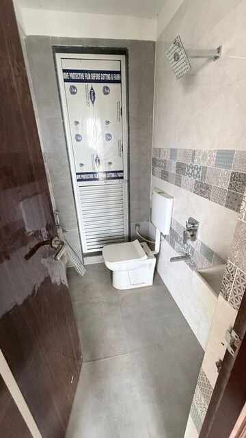 Bathroom in 1 BHK Apartment at Aastha River View, Taloja – for Rent