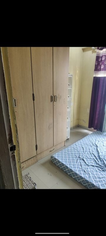 Bedroom in 1 BHK Apartment at Omkar Vayu, Mahim – for Rent