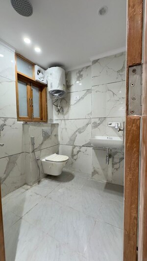 Bathroom in 2 BHK Builder Floor at Chattarpur – for Rent