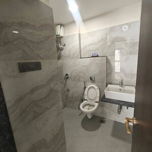 Bathroom in 1 BHK Apartment at JP Eminence, Andheri West – for Rent