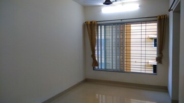Room in 1.5 BHK Apartment at Andheri West – for Sale