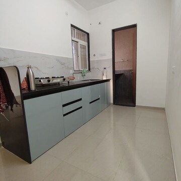 Kitchen in 2 BHK Apartment at Kolte Patil Life Republic 16th Avenue Arezo, Hinjewadi – for Rent