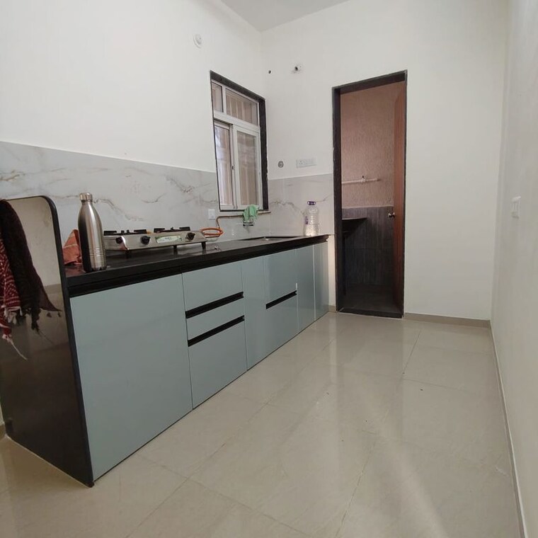 Kitchen, kolte-patil-life-republic-16th-avenue-arezo 2 Bedroom 665 Sq.Ft. Apartment In Hinjewadi Pune 9932471