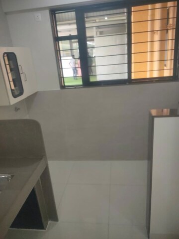 Kitchen in 2.5 BHK Apartment at Magarpatta Riverview City Hornbill Heights, Loni Kalbhor – for Sale