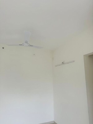 Room in 2 BHK Apartment at Kumar Palmspring Towers, Undri – for Sale