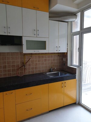 Kitchen in 3 BHK Apartment at Mahagun Mywoods, Sector 16c Greater Noida – for Rent