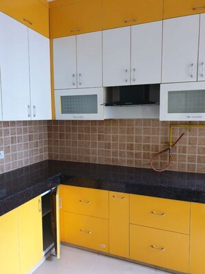 Kitchen in 3 BHK Apartment at Mahagun Mywoods, Sector 16c Greater Noida – for Rent