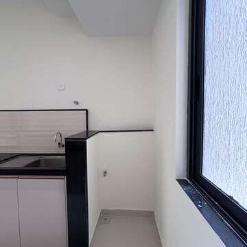 Kitchen in 2 BHK Apartment at Dynamix Divum, Riddhi Gardens – for Rent