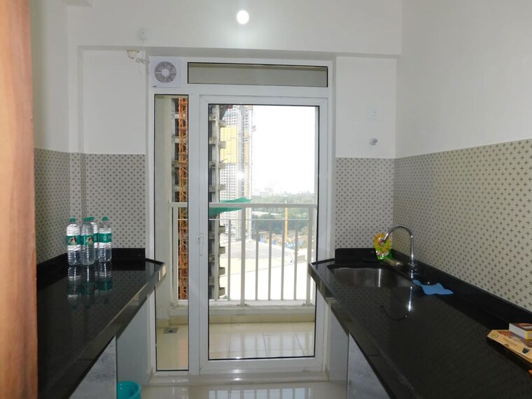 Kitchen, lodha-amara-tower-32-and-33 1 Bedroom 428 Sq.Ft. Apartment In Kolshet Road Thane 9932630