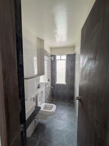 Bathroom in 3 BHK Apartment at Majestique Rhythm County Phase 2, Handewadi – for Sale