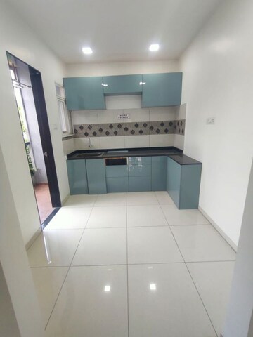 Kitchen in 3 BHK Apartment at Majestique Rhythm County Phase 2, Handewadi – for Sale