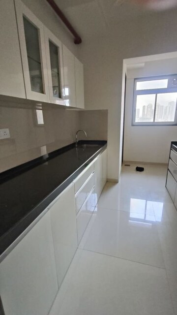 Kitchen in 3 BHK Apartment at Runwal Nirvana, Parel – for Rent