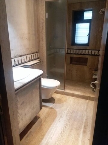 Bathroom in 2 BHK Apartment at Dhanshree Garden View, Dahisar East – for Rent