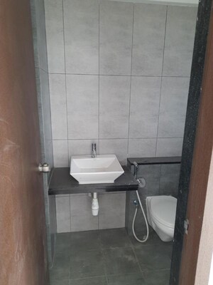 Bathroom in 2 BHK Apartment at Pride World City Kingsbury, Charholi Budruk – for Rent