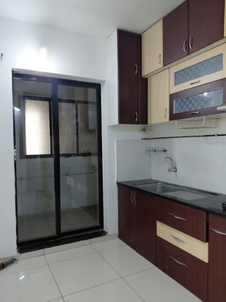 Kitchen, pride-world-city-kingsbury 3 Bedroom 1100 Sq.Ft. Apartment In Charholi Budruk Pune 9932768