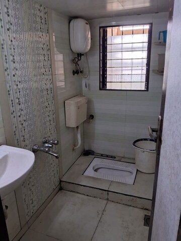 Bathroom in 2 BHK Apartment at Vasant Vihar – for Rent