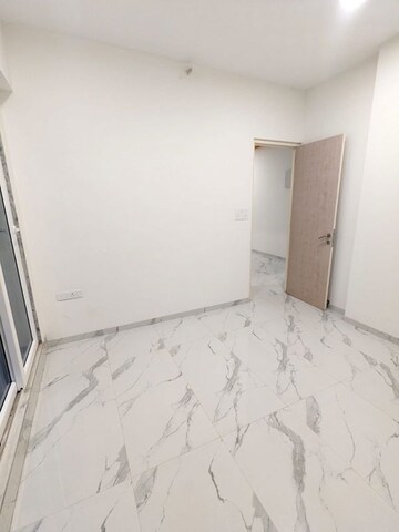 Room in 1 BHK Apartment at Ruparel Sky Green, Kandivali West – for Sale