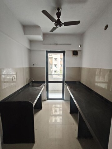 Kitchen in 1.5 BHK Apartment at Lodha Lakeshore Greens, Dombivli East – for Sale